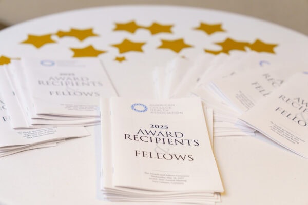 Photo of Awards and Fellows program booklet displayed on table